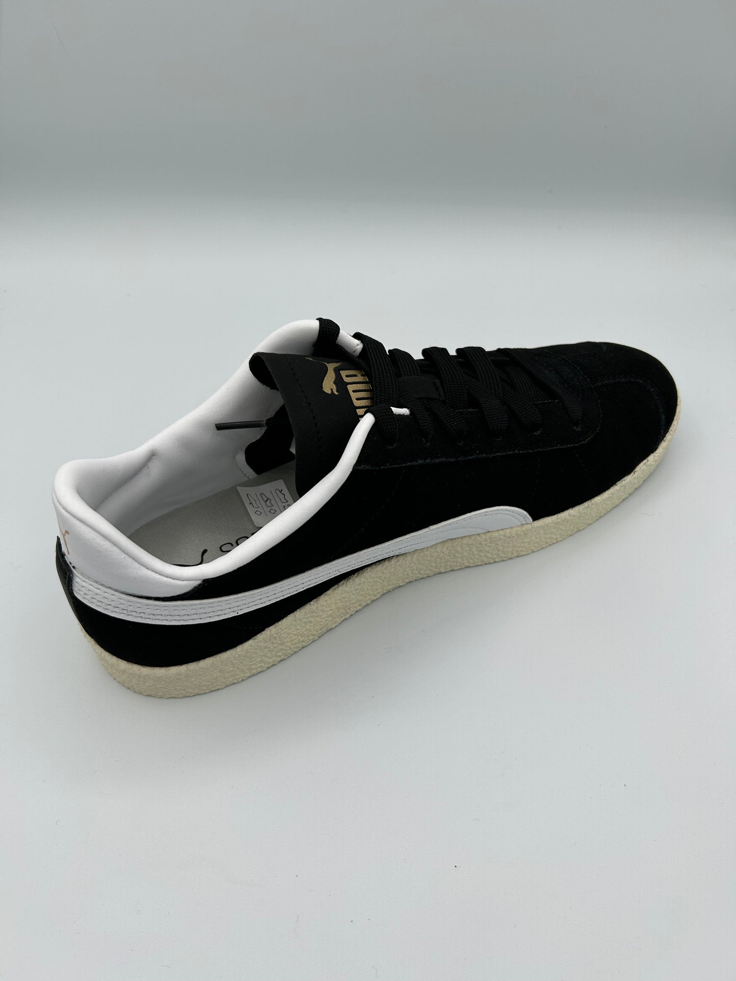 Puma Iconic suede look black white and gold