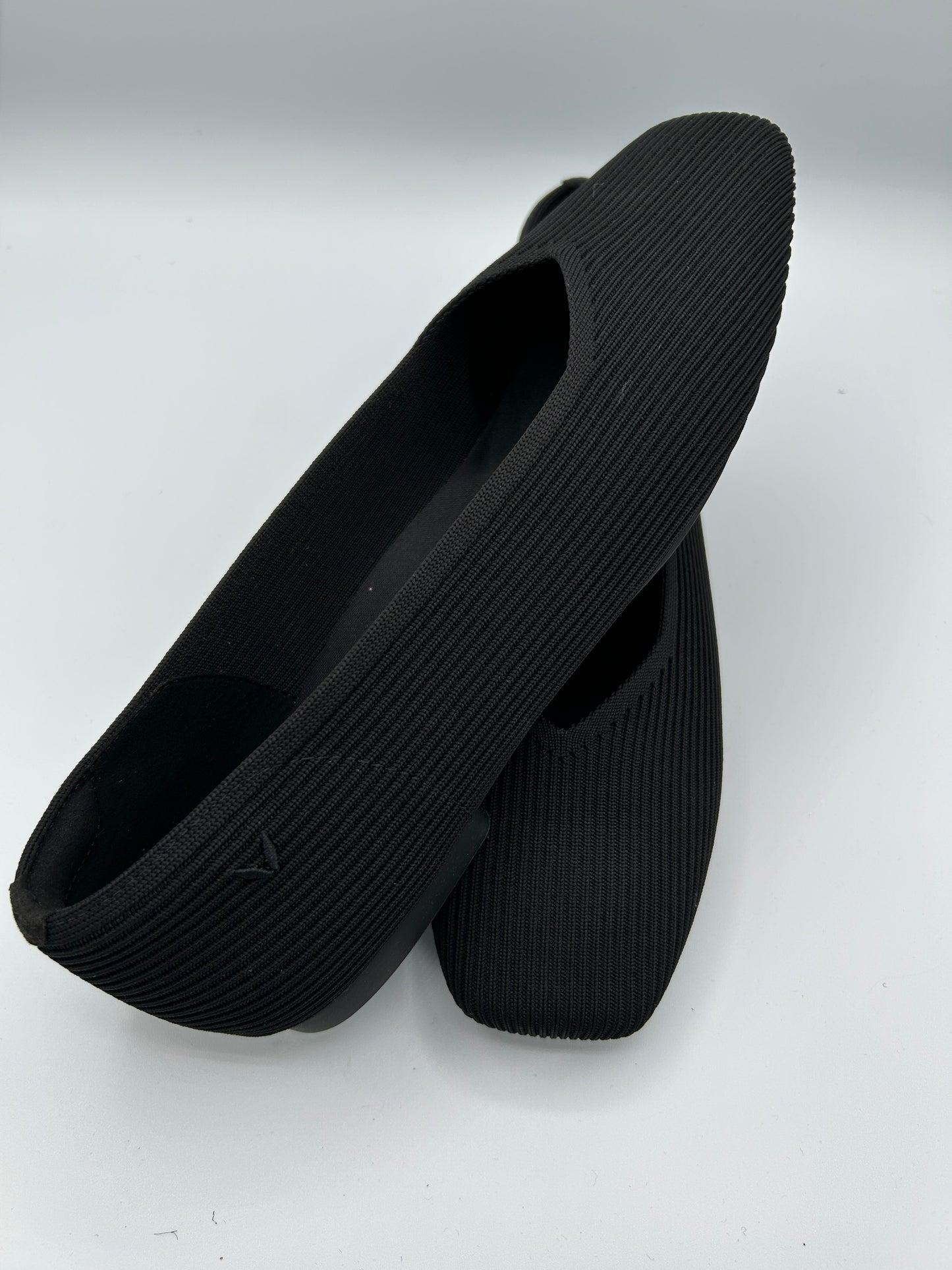 Black Vivaia flats