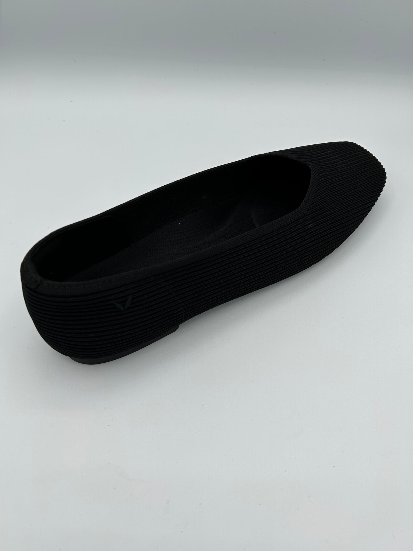 Black Vivaia flats